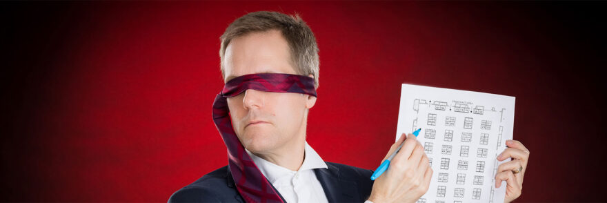 Joe finds a booth location while wearing a blindfold.