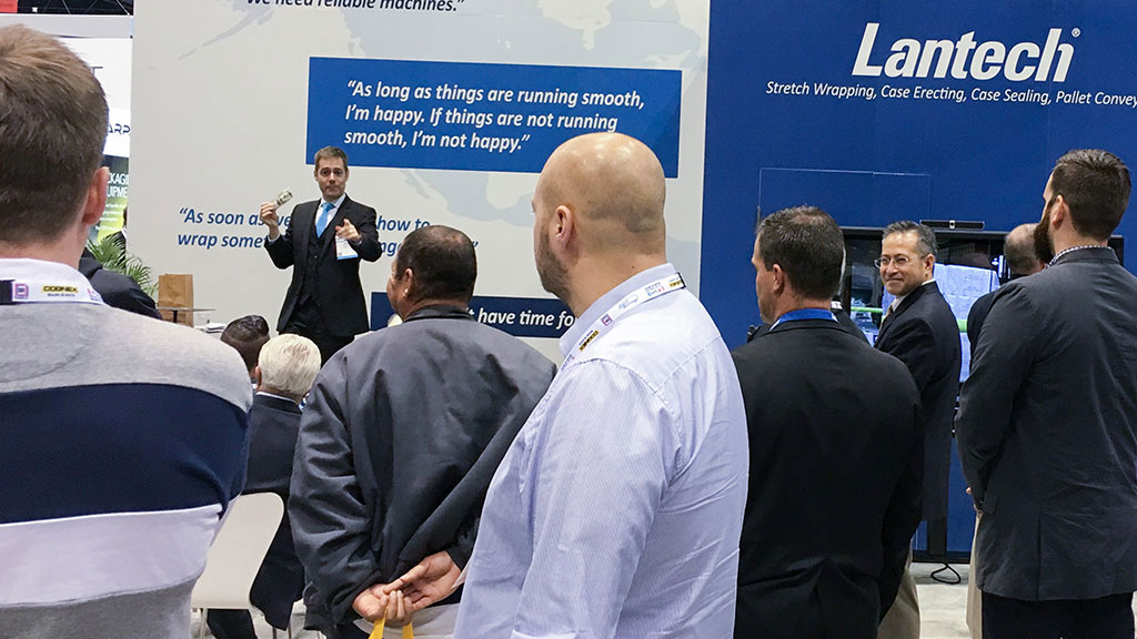Joe educates and informs in a large island exhibit