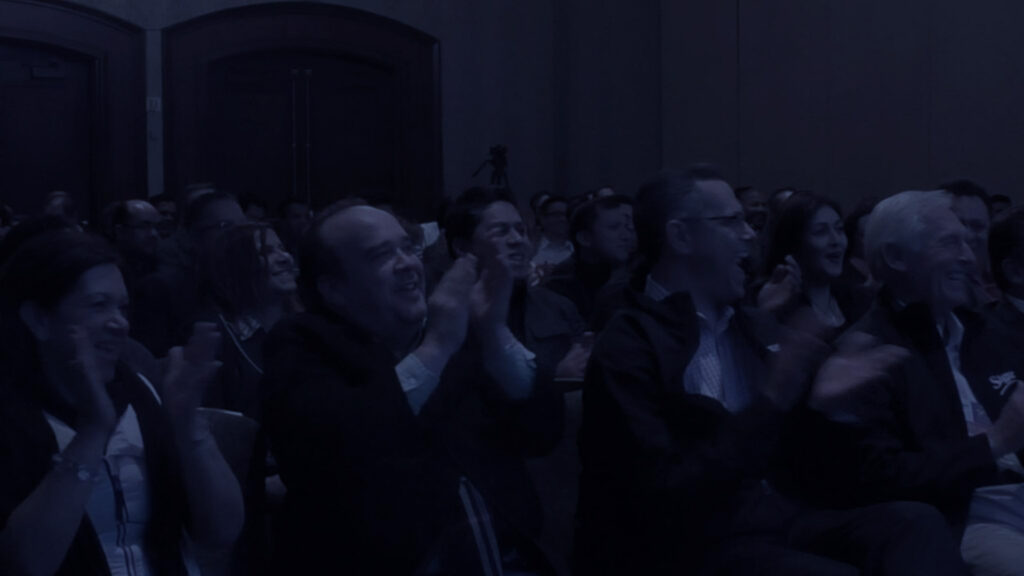 Audience applause for Joe Skilton, a top corporate mentalist for hire.