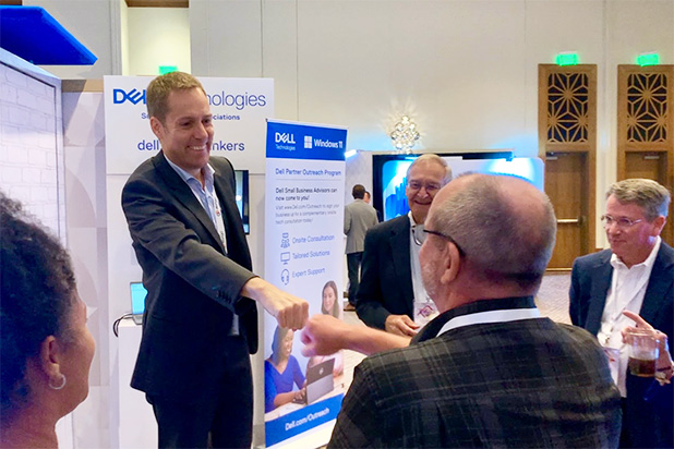 Trade show magician and mentalist Joe Skilton at the Dell booth.