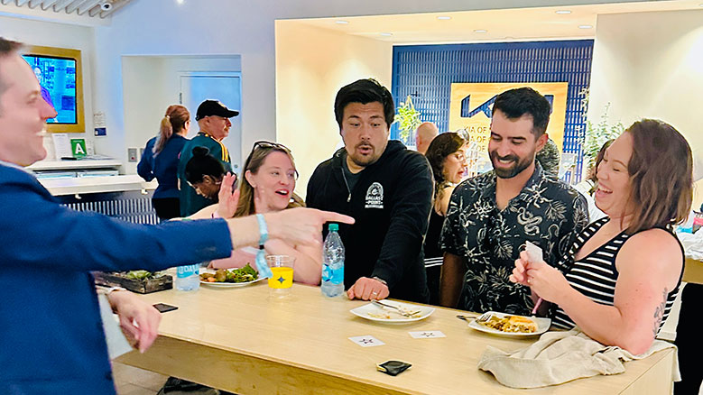 LA Galaxy fans enjoy an ESP card matching routine in the VIP lounge.