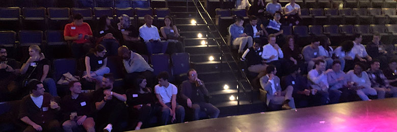 Gibson Dunn interns begin to take their seats at Illusion Magic Lounge.