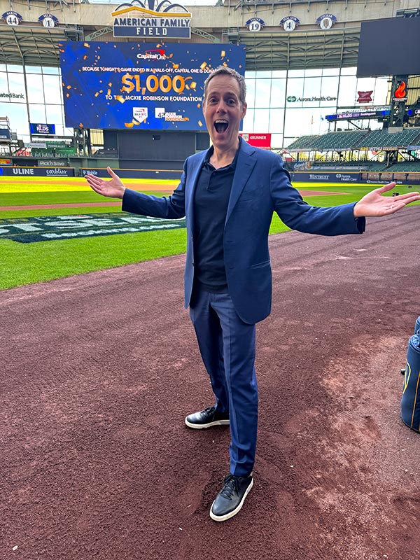 Joe Skilton on the field about to entertain the team in Milwaukee